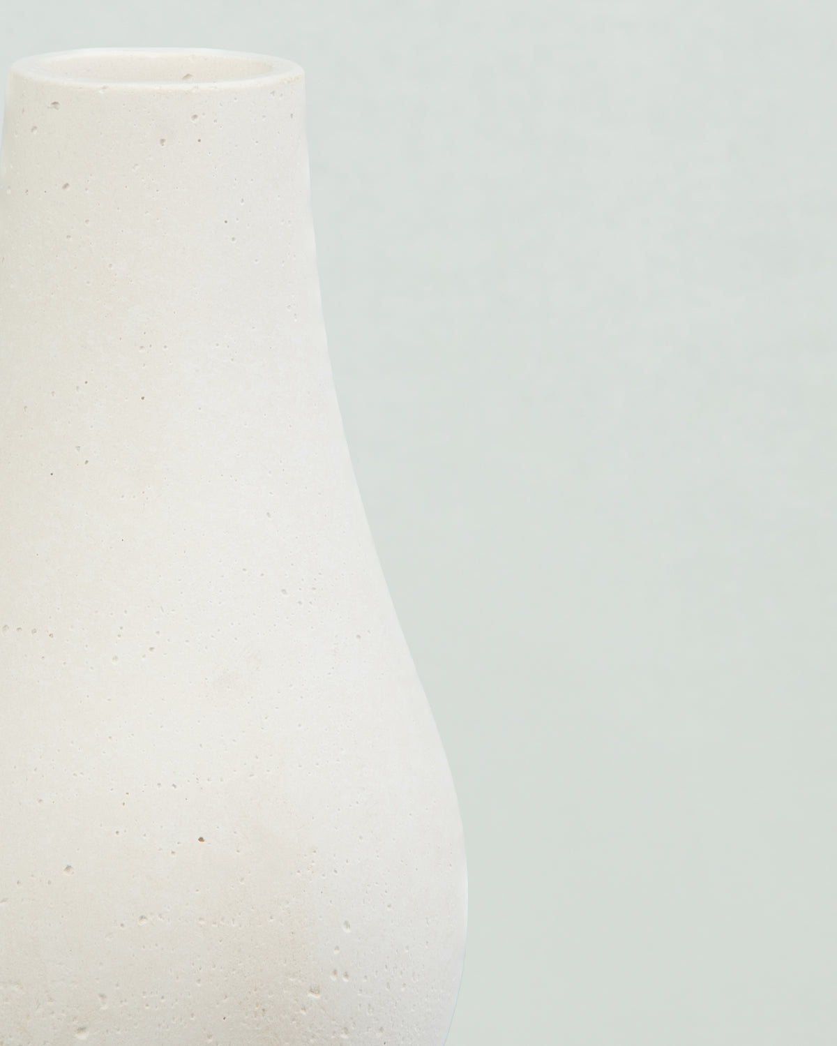 Pearlescent Charm: White Concrete Bottle in Pear Shape