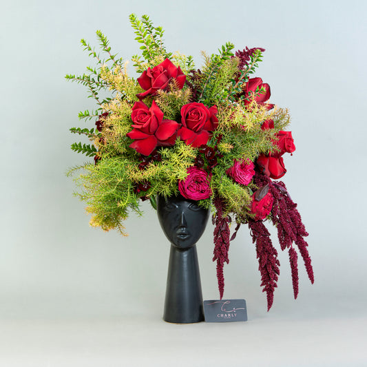 Mystic Floral Portrait: Red Roses and Amaranthus in Porcelain Face Vase